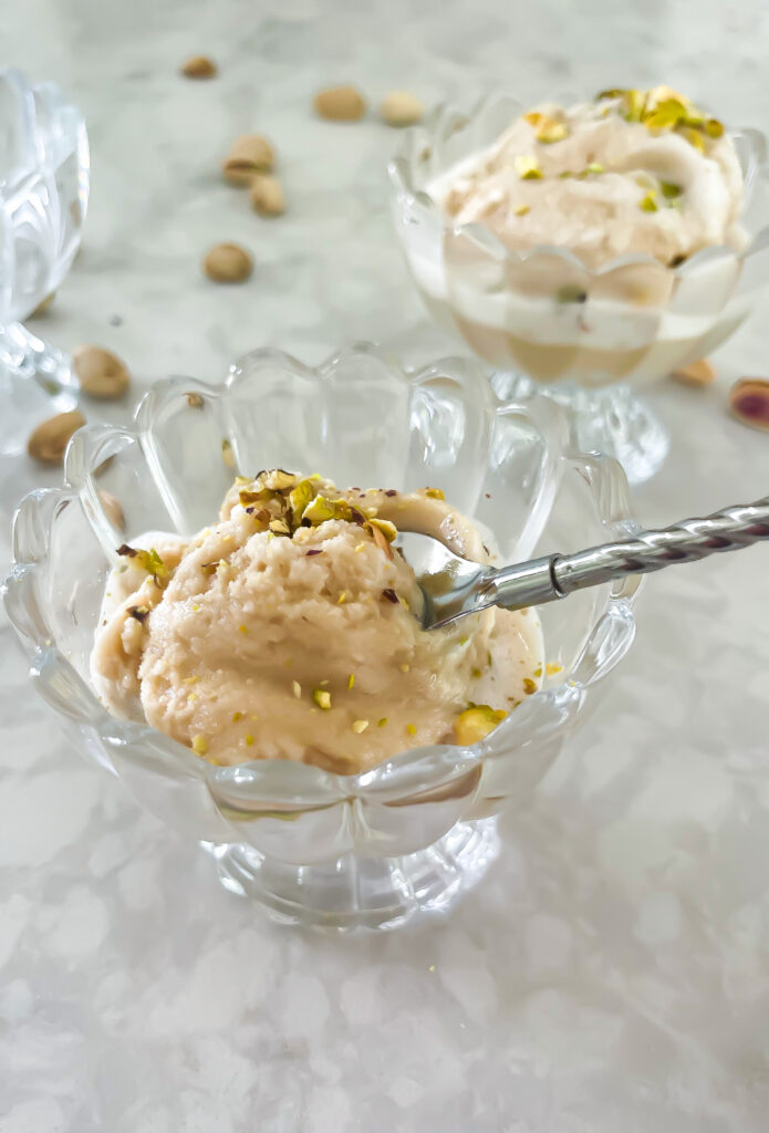 This Dairy-Free Pistachio Ice Cream Recipe comes together in just four ingredients and is eggless making it vegan ice cream! Find the simple recipe at kirstenturk.com