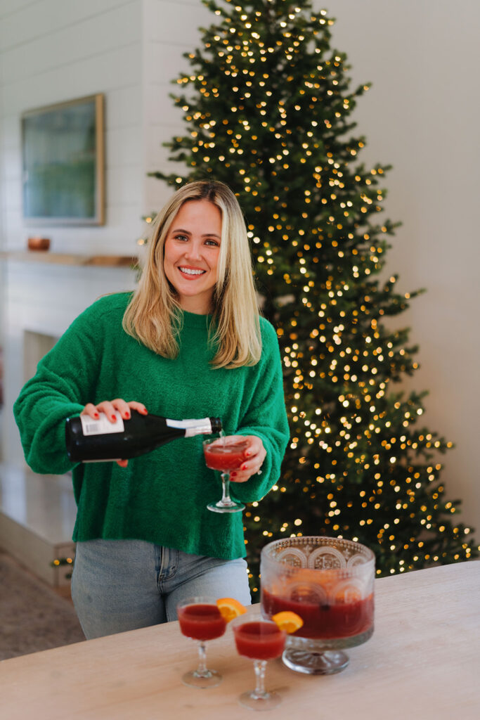 This Holiday Brunch Punch makes the perfect Christmas morning breakfast and brunch cocktail or mocktail. It's perfect for kids and adults and is a festive holiday punch recipe | On the blog at kirstenturk.com