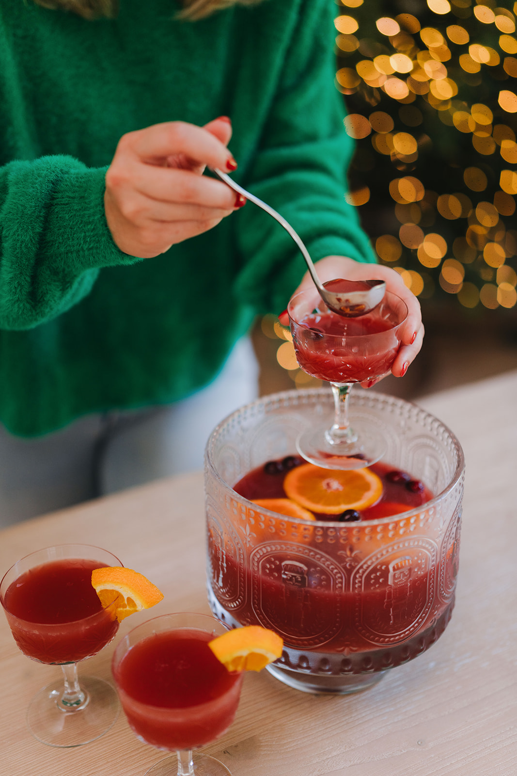 This Holiday Brunch Punch makes the perfect Christmas morning breakfast and brunch cocktail or mocktail. It's perfect for kids and adults and is a festive holiday punch recipe | On the blog at kirstenturk.com