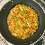 This Simple Veggie Chow Mein in a Wok makes an easy week night meal when you top it with your favorite protein like a fried egg or shrimp! This is an easy dinner recipe and perfect for making Chinese takeout at home! Get the full recipe on kirstenturk.com