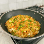 This Simple Veggie Chow Mein in a Wok makes an easy week night meal when you top it with your favorite protein like a fried egg or shrimp! This is an easy dinner recipe and perfect for making Chinese takeout at home! Get the full recipe on kirstenturk.com