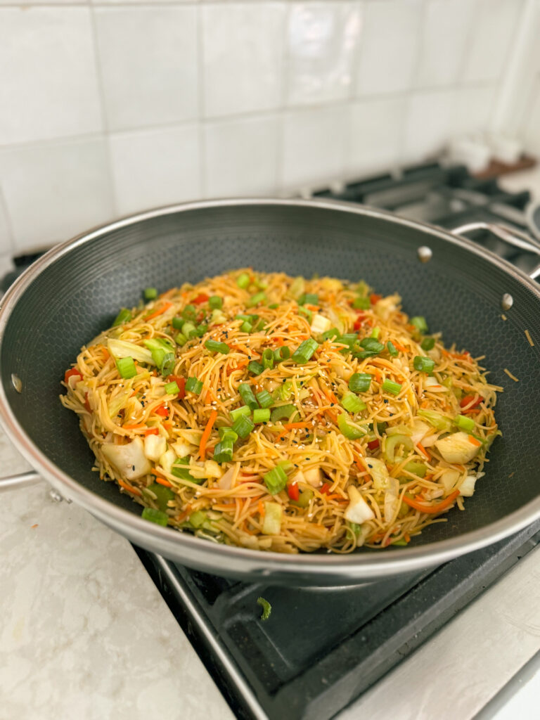 This Simple Veggie Chow Mein in a Wok makes an easy week night meal when you top it with your favorite protein like a fried egg or shrimp! This is an easy dinner recipe and perfect for making Chinese takeout at home! Get the full recipe on kirstenturk.com