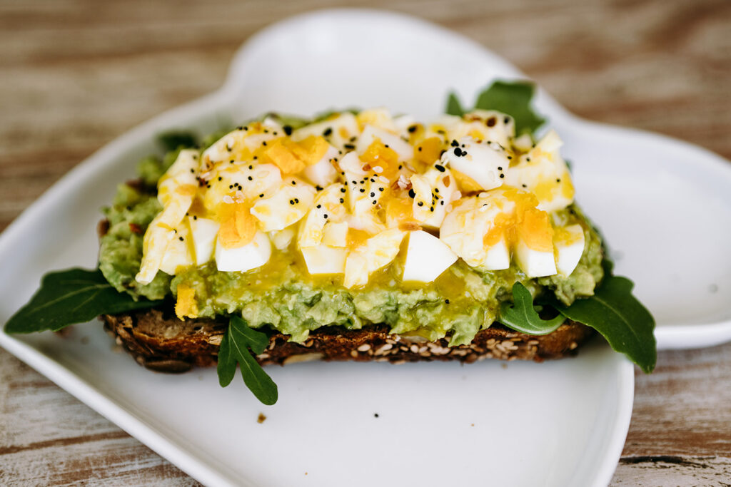 This simple, yet delicious avocado toast recipe is the best because it's easily customizable. Get all the details on the blog at kirstenturk.com | It's the perfect healthy breakfast idea to start the day!